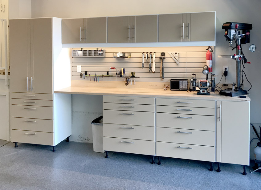 Organized garage with slatwall panels and accessories